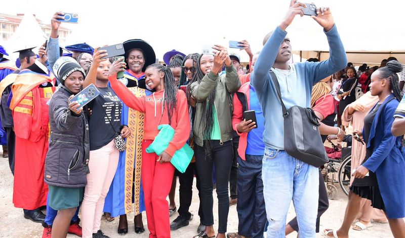 First-year students taking a selfie with the Vice-Chancellor